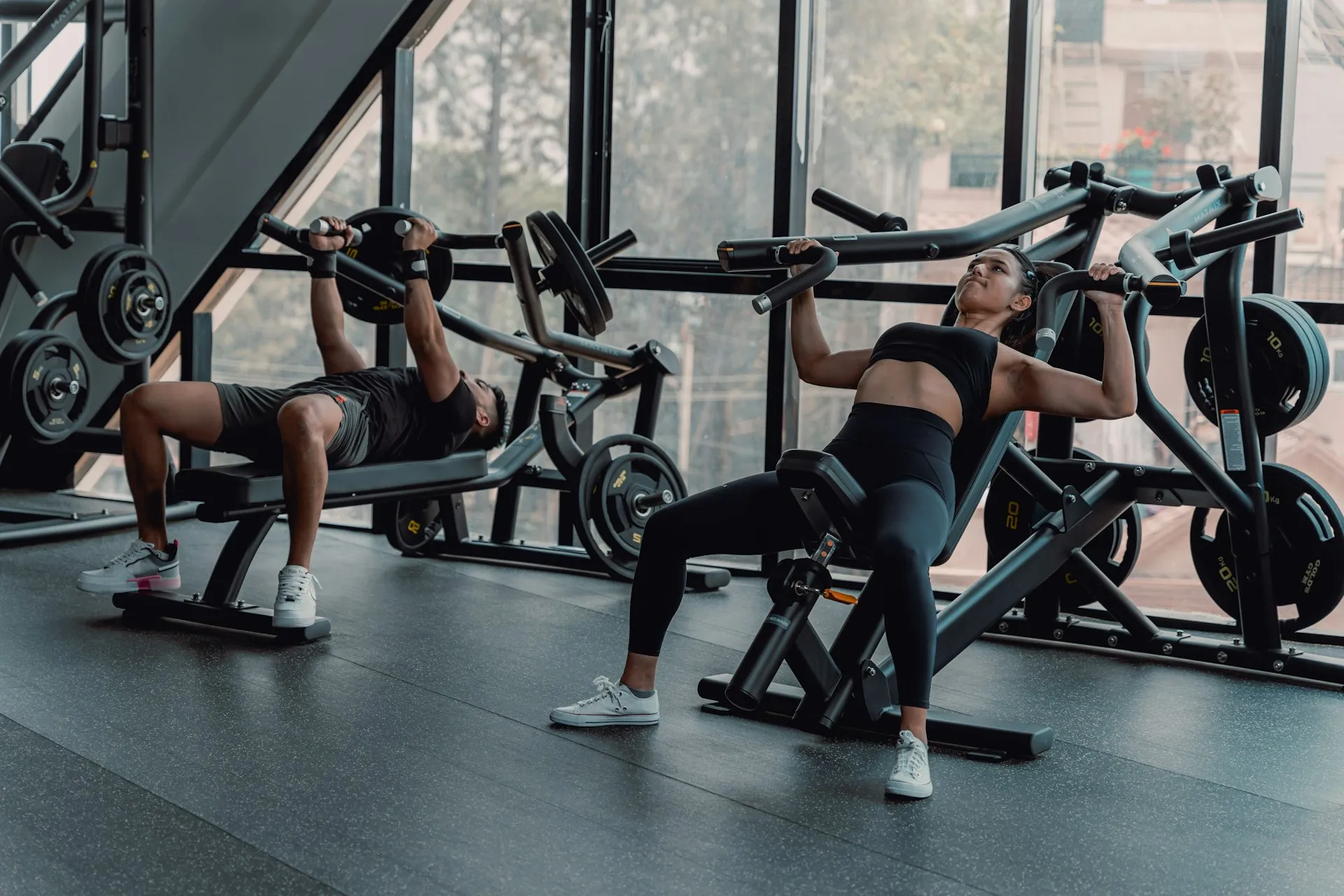 A group training together on the floor of a fitness studio